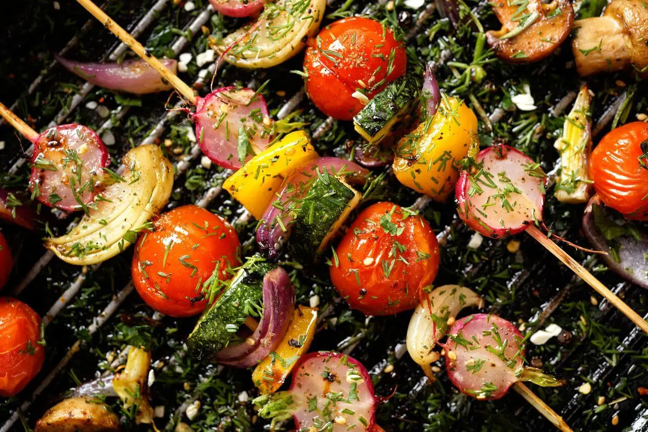 Grilled vegetables with cherry tomatoes, radishes, peppers and onions
